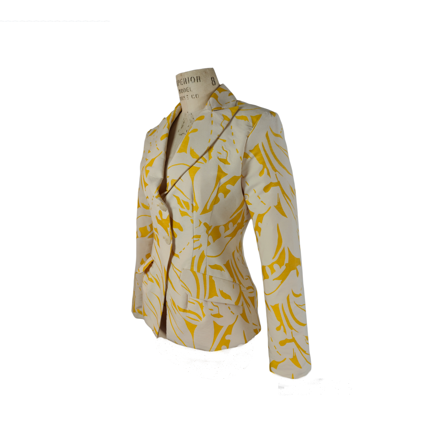 Side of slim fit blazer with a two button closure in beige with yellow patterns