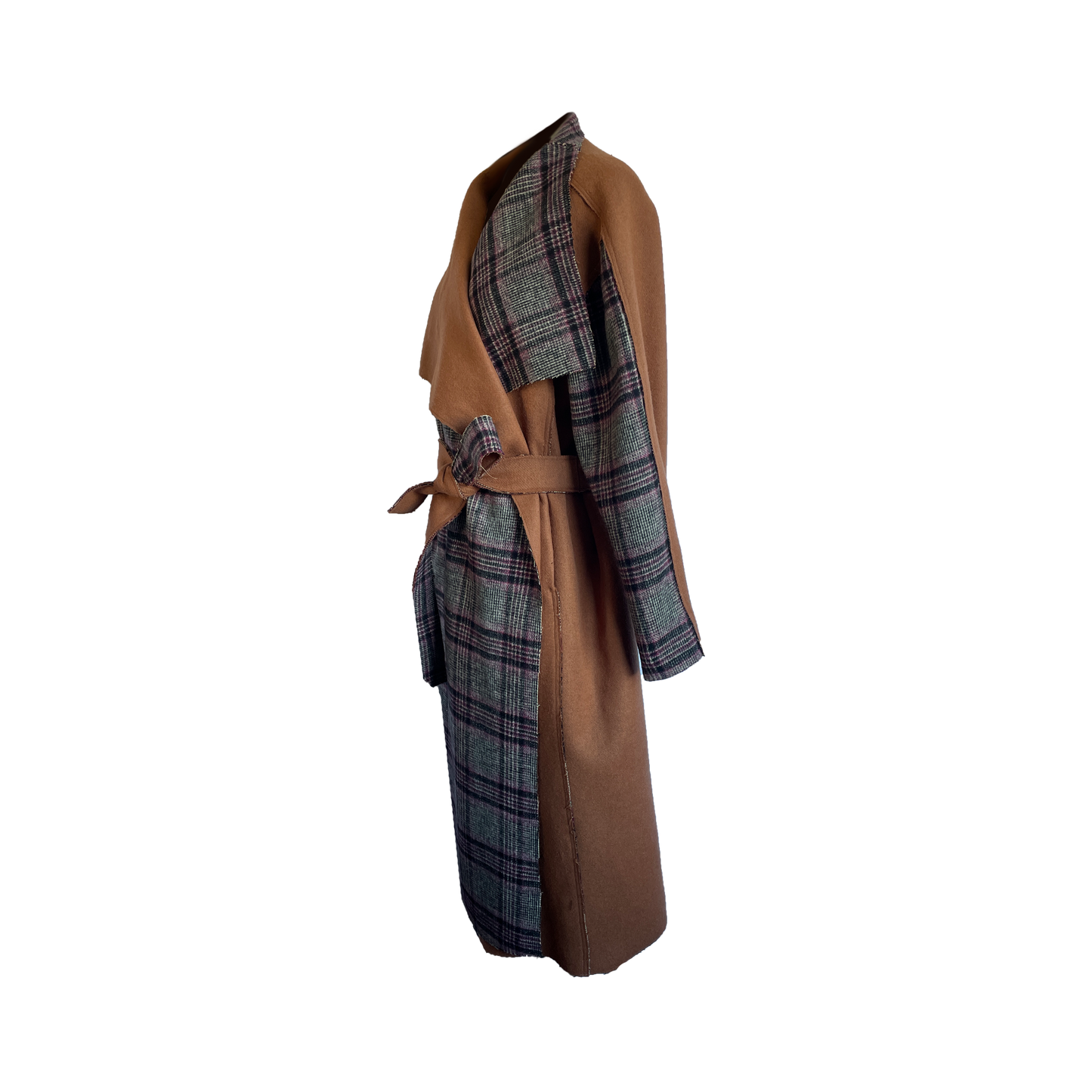 Side of double faced plaid wool coat with a wide lapel and accented sleeves.