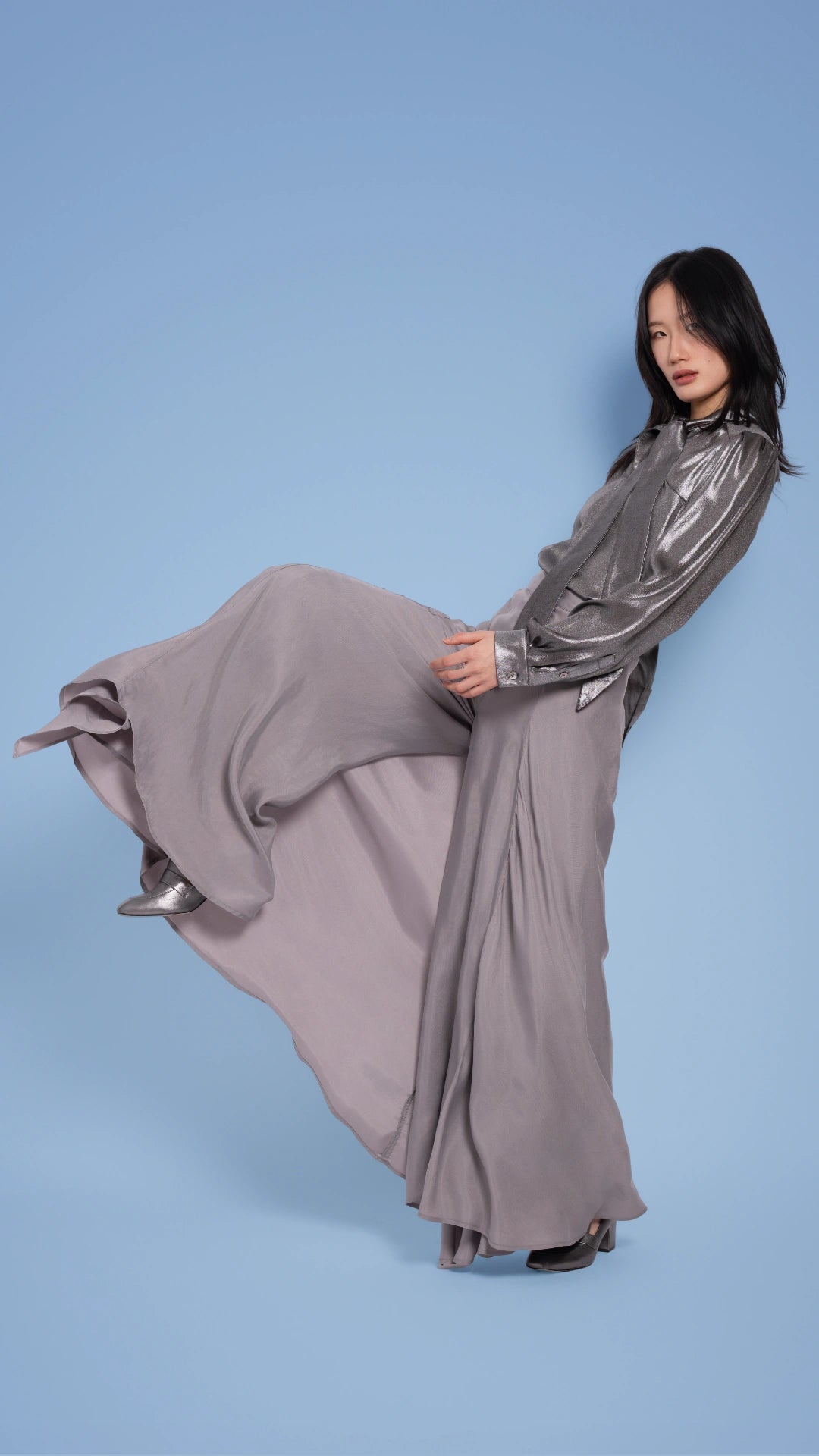 Model wearing Flowy wide-legged pants in taupe  Model: @dawnofxiao