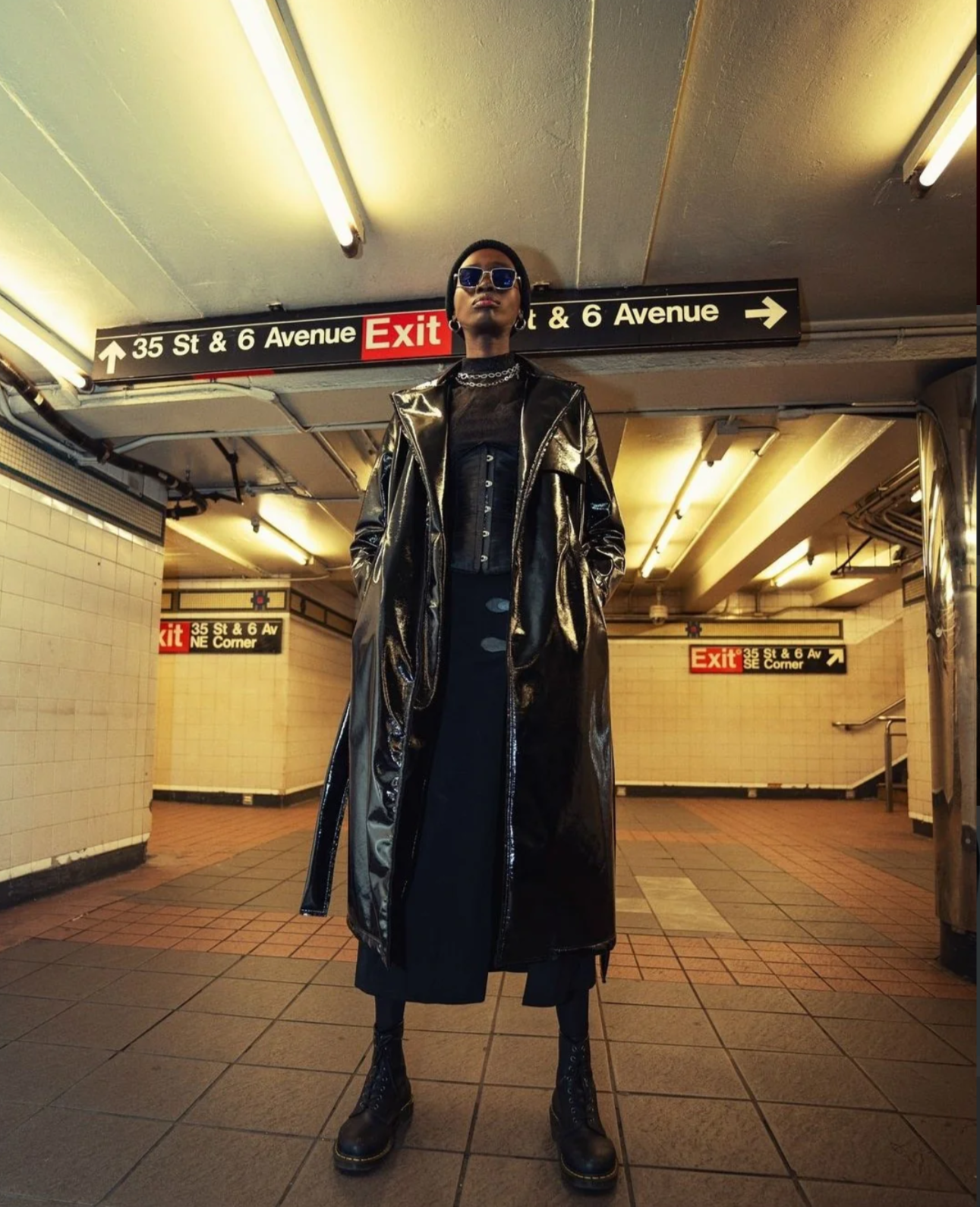 Woman wearing black lacquer leather trench coat standing in an underground subway tunnel hallway.

Our Ubud coat takes on the streets of NYC in these great image by @matinsdreams featuring @balangnyal