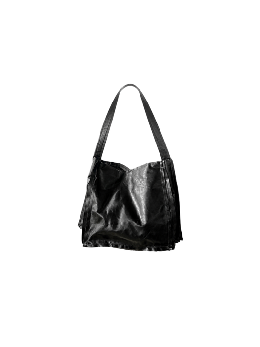 An accordion leather bag with a shoulder strap 
