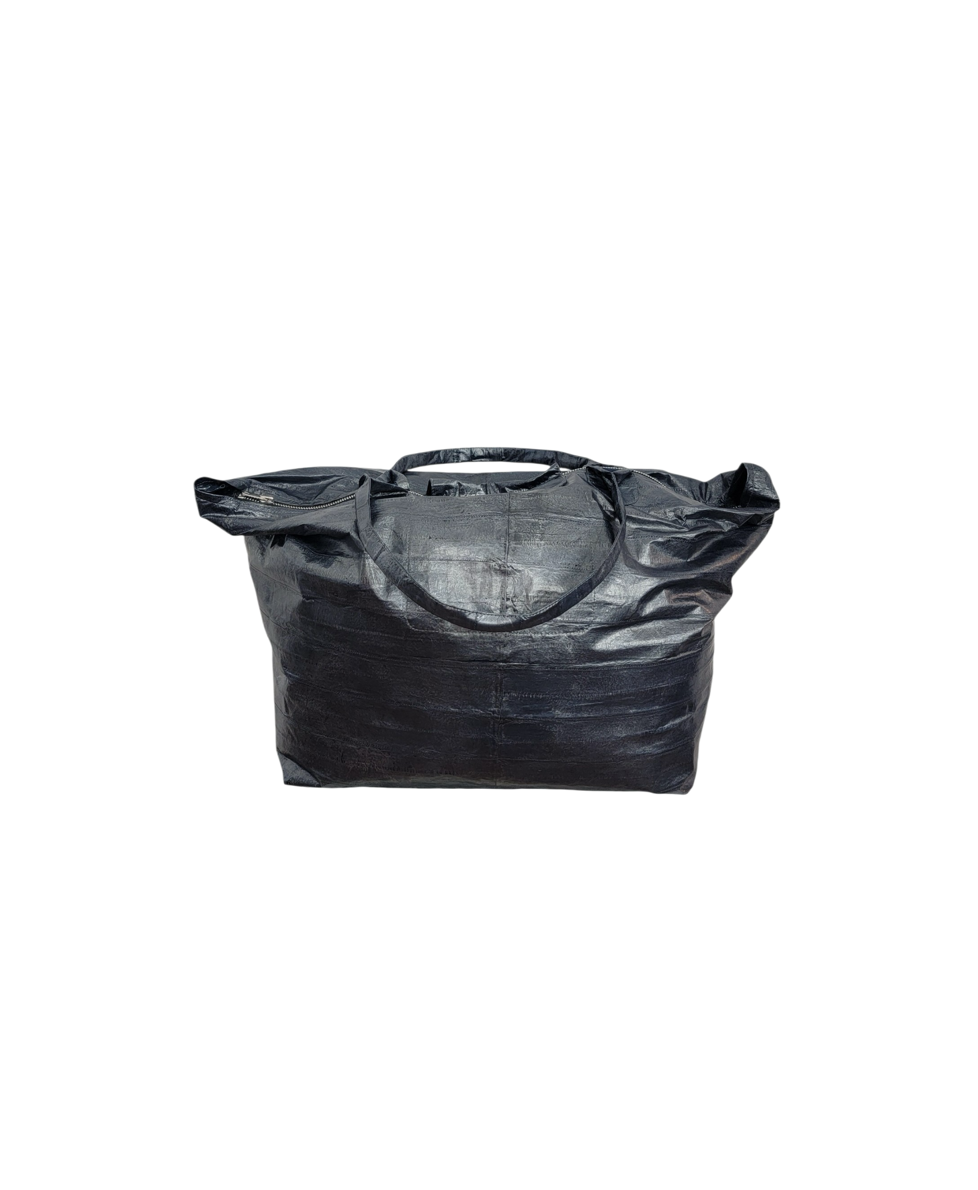 A blue eelskin leather tote bag with a prominent silver star-shaped hardware accent on the front