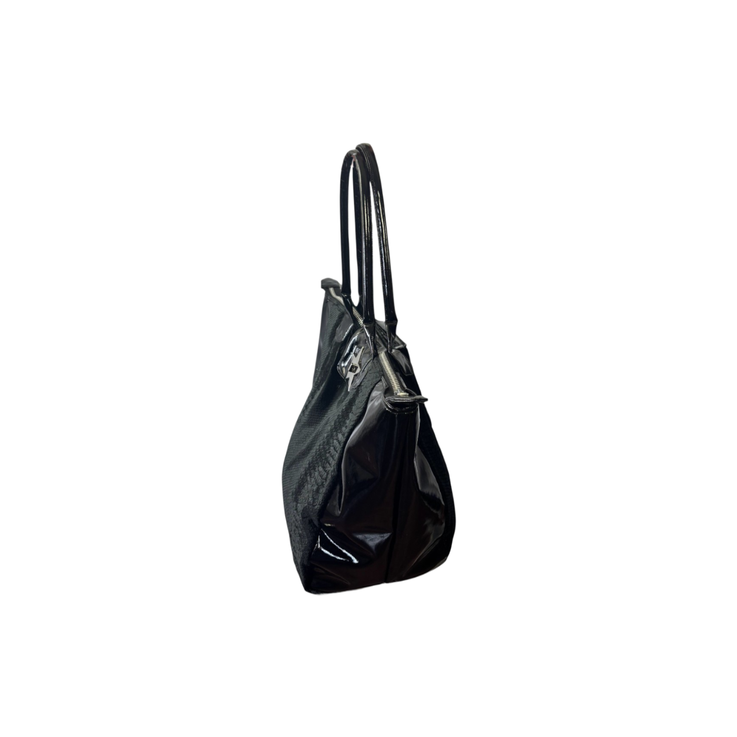 A black crocodile velvet bag with glossy patent leather side panels, and a prominent silver star-shaped metal clasp on the front