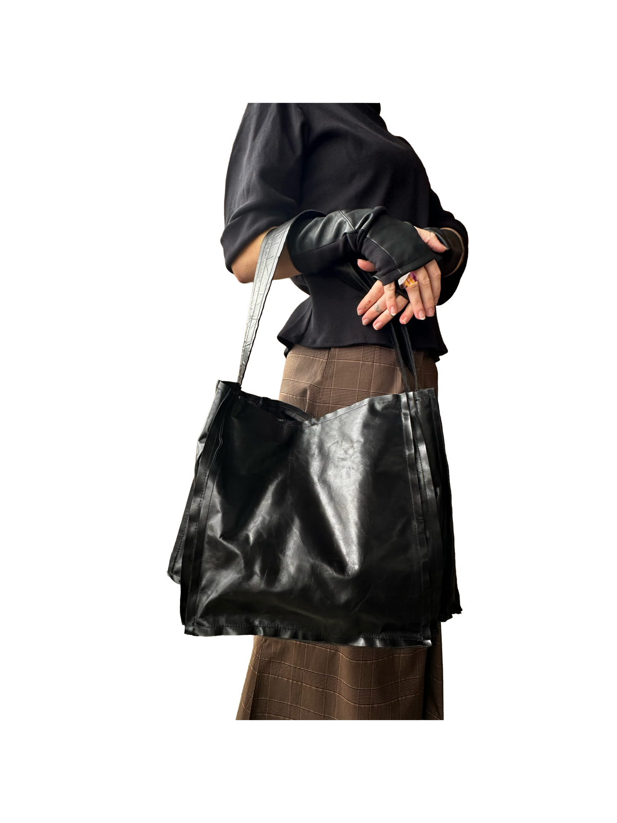 An accordion leather bag with a shoulder strap 
