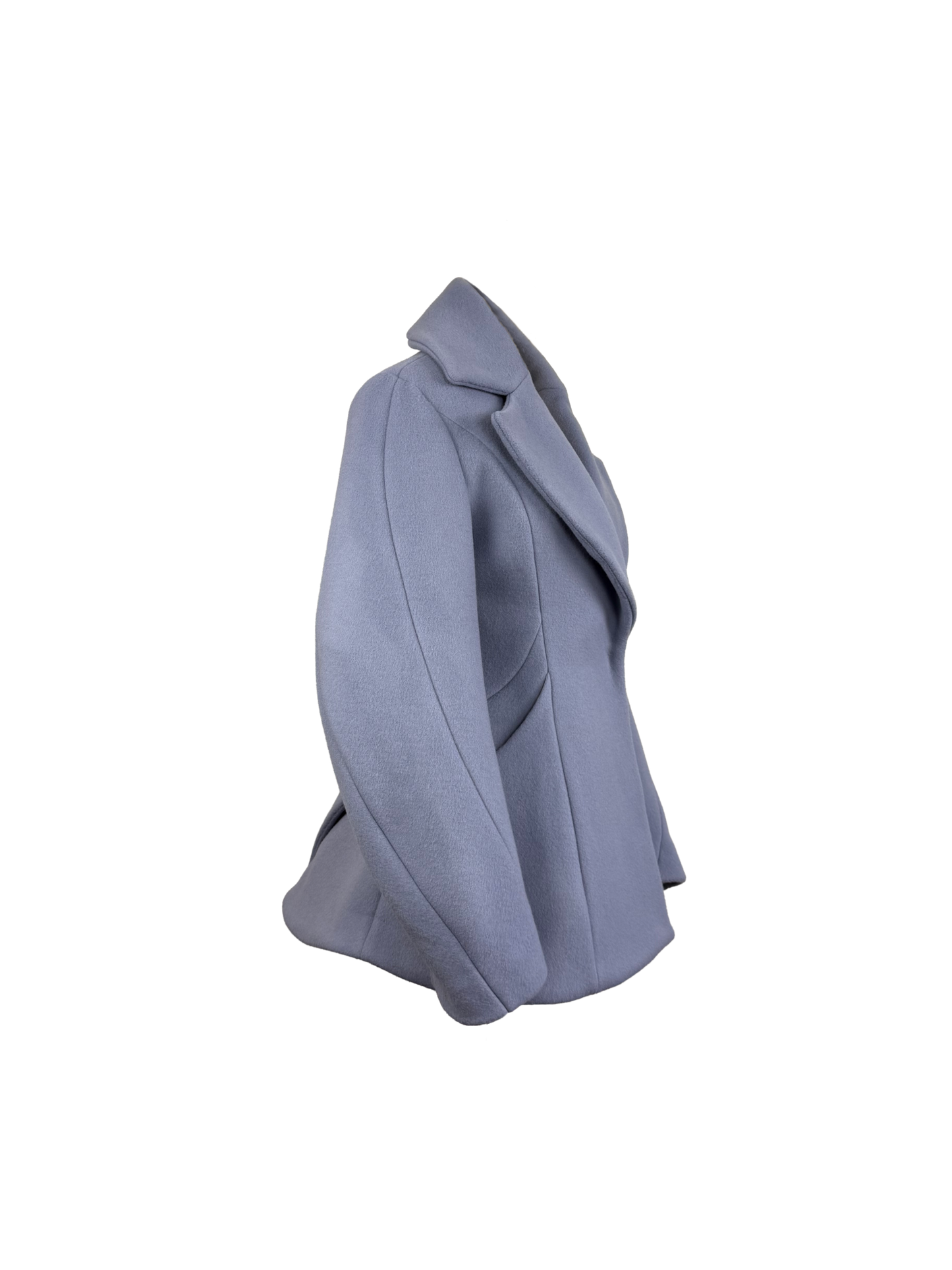 A light periwinkle blue tailored coat with wide lapels, barrel sleeves, and structured shoulders