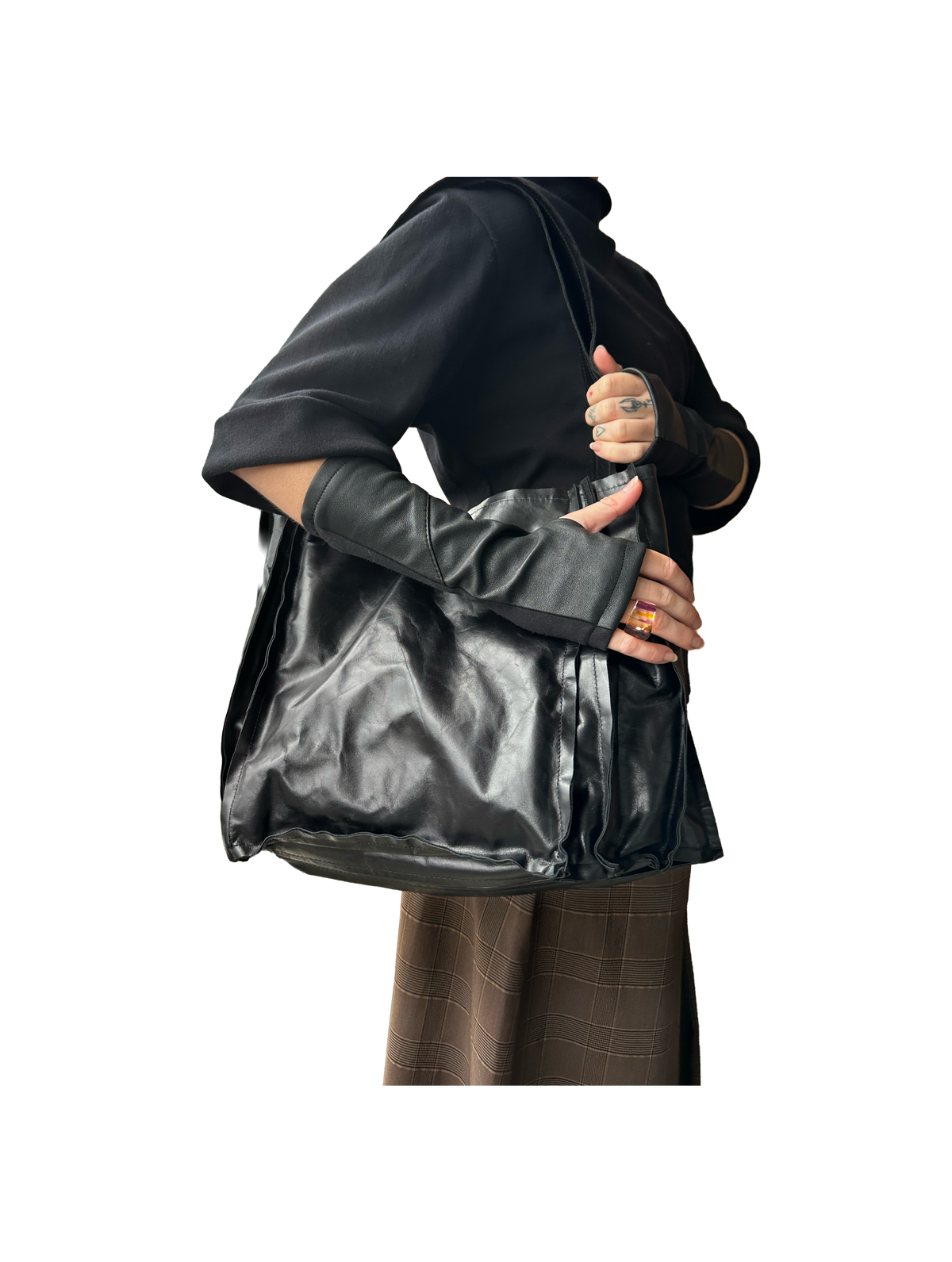  An accordion leather bag with a shoulder strap 