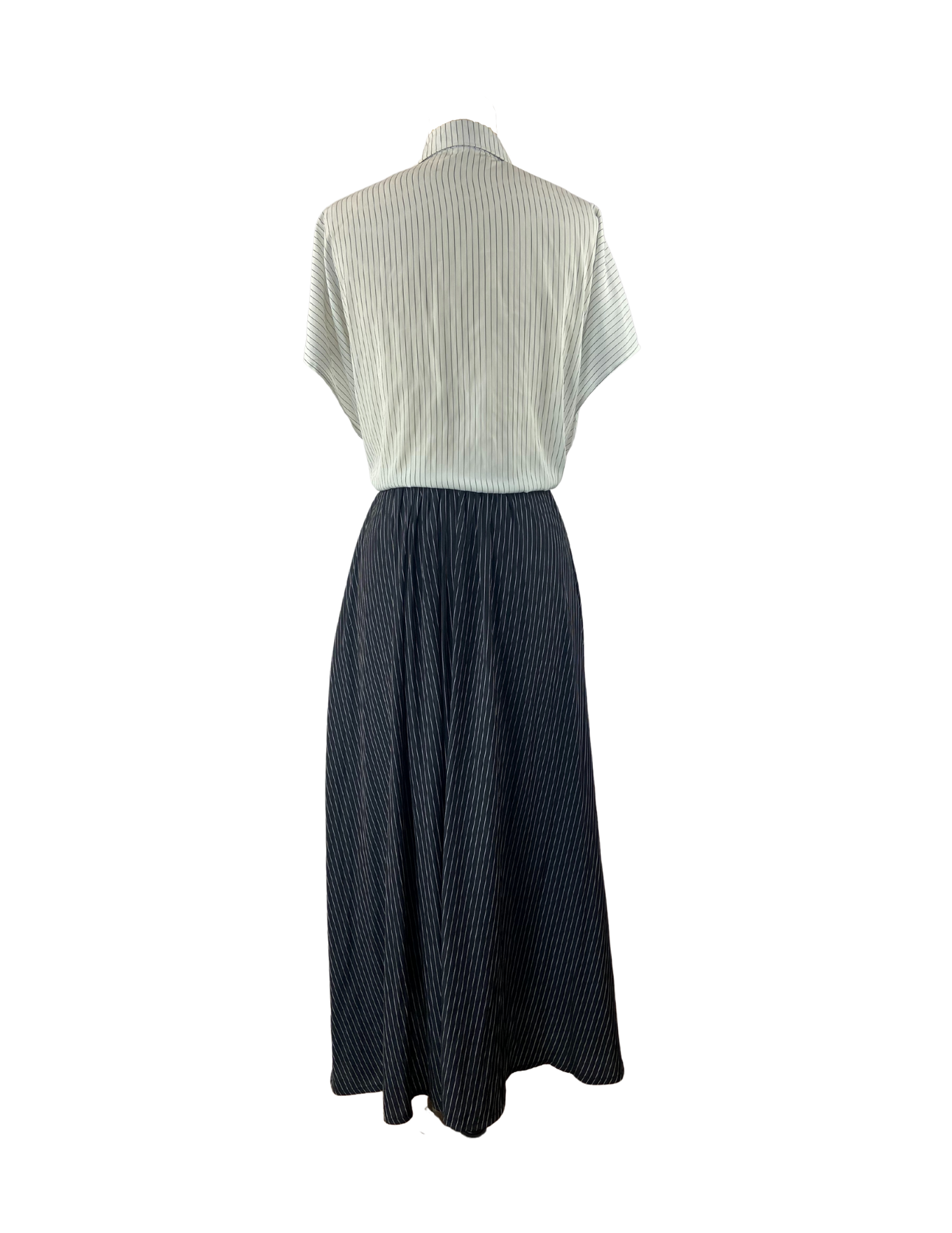 Back of cupro dress with white pinstripe top and black pinstripe bottom with an adjustable waist