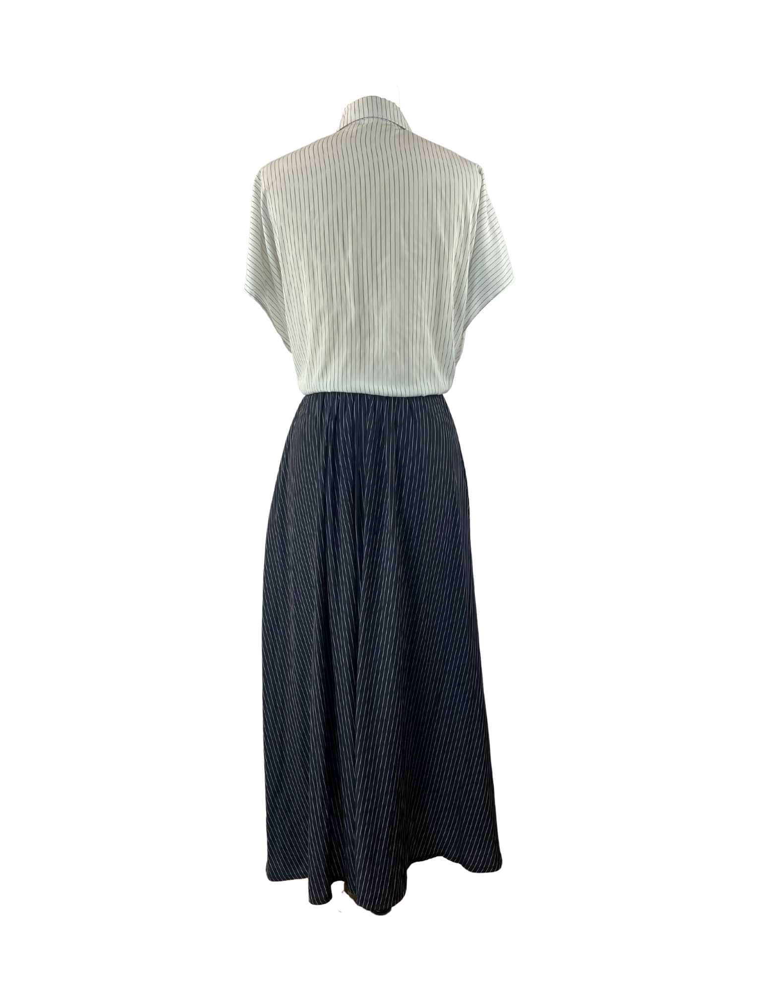 Back of cupro dress with white pinstripe top and black pinstripe bottom with an adjustable waist